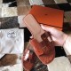 Hermes Oran Sandals In Orange Shiny Niloticus Crocodile