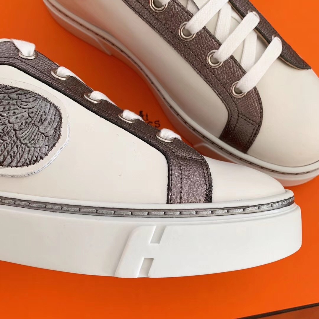 Hermes Velvet Sneakers In Blanc Calfskin With Printed Wing Patch