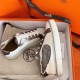 Hermes Velvet Sneakers In Blanc Calfskin With Printed Wing Patch