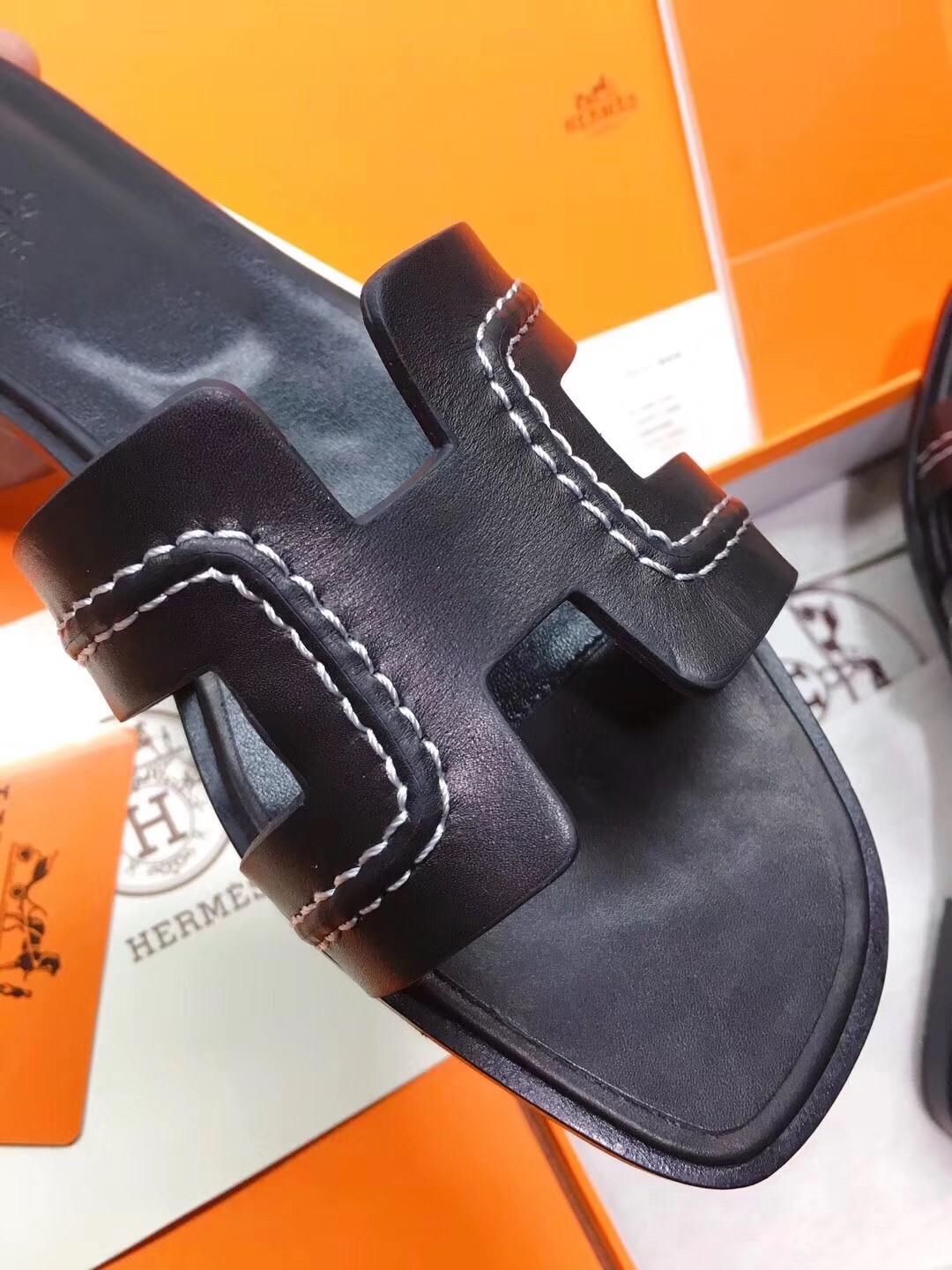 Hermes Oran Sandals In Black Leather With Stitched Detail