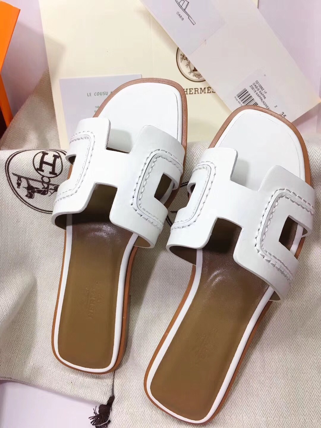 Hermes Oran Sandals In White Leather With Stitched Detail