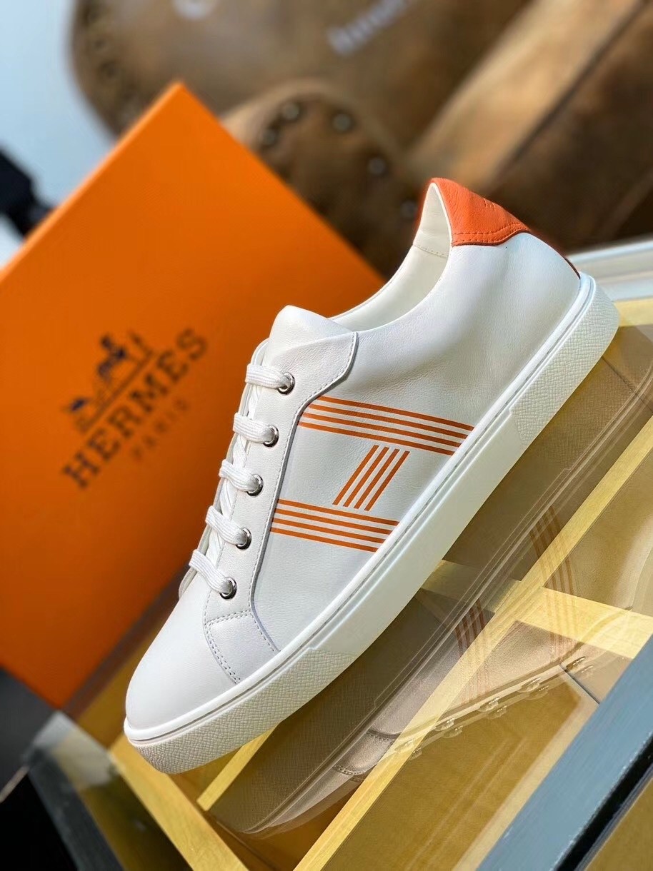 Hermes Avantage Sneakers In White/Orange Calfskin