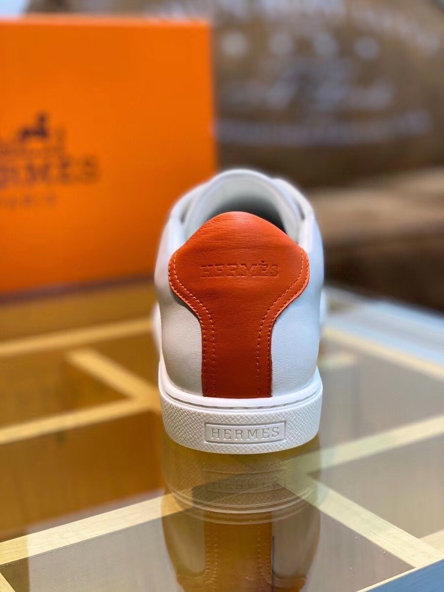 Hermes Avantage Sneakers In White/Orange Calfskin