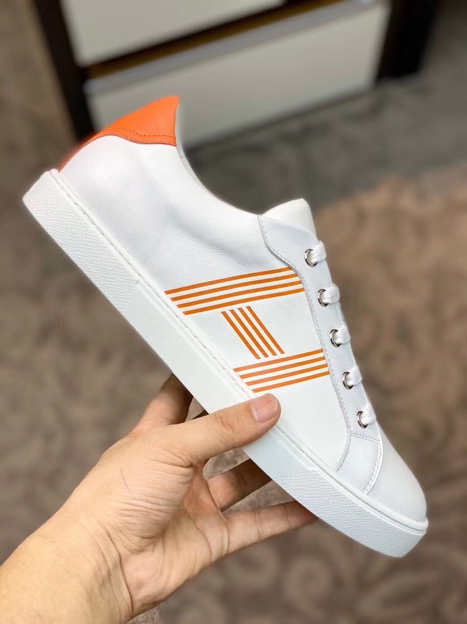 Hermes Avantage Sneakers In White/Orange Calfskin