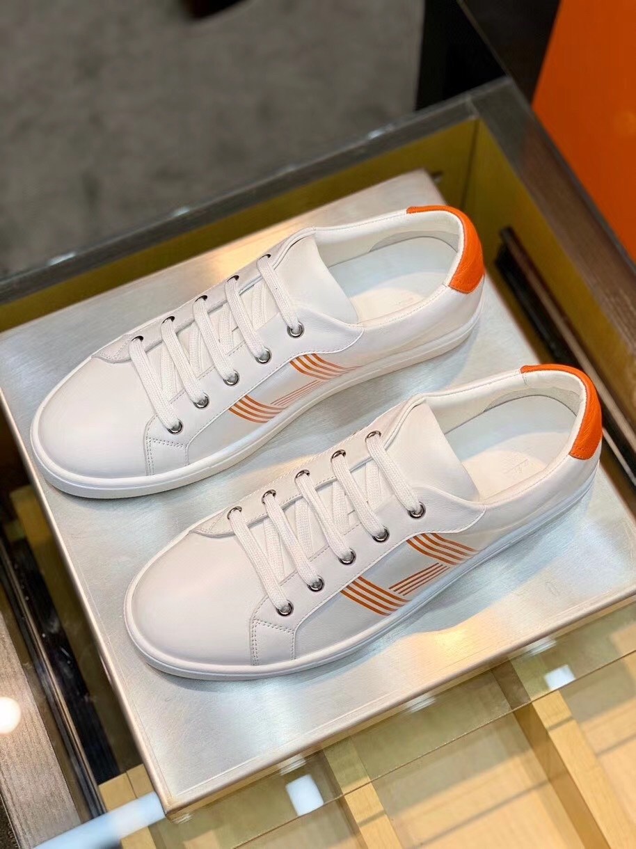 Hermes Avantage Sneakers In White/Orange Calfskin