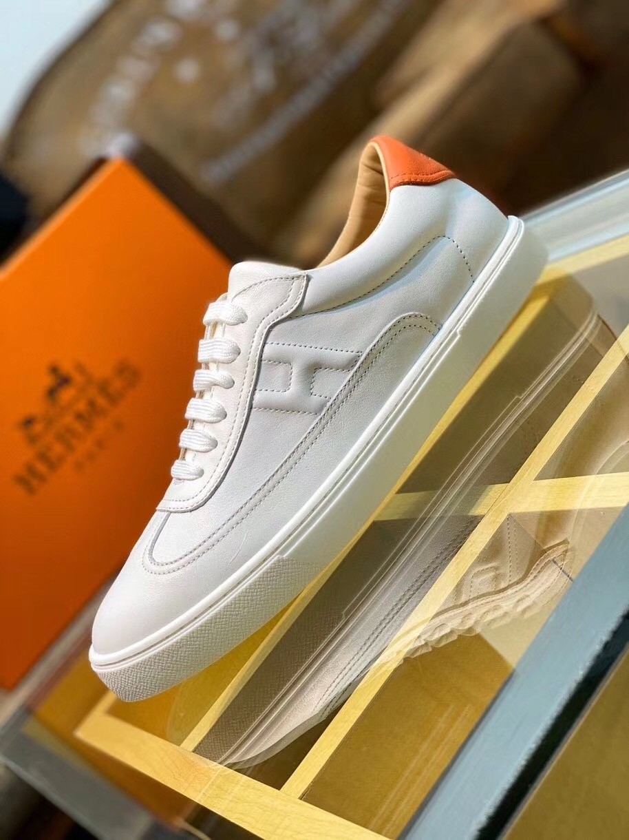 Hermes Quicker Sneakers In White/Orange Calfskin