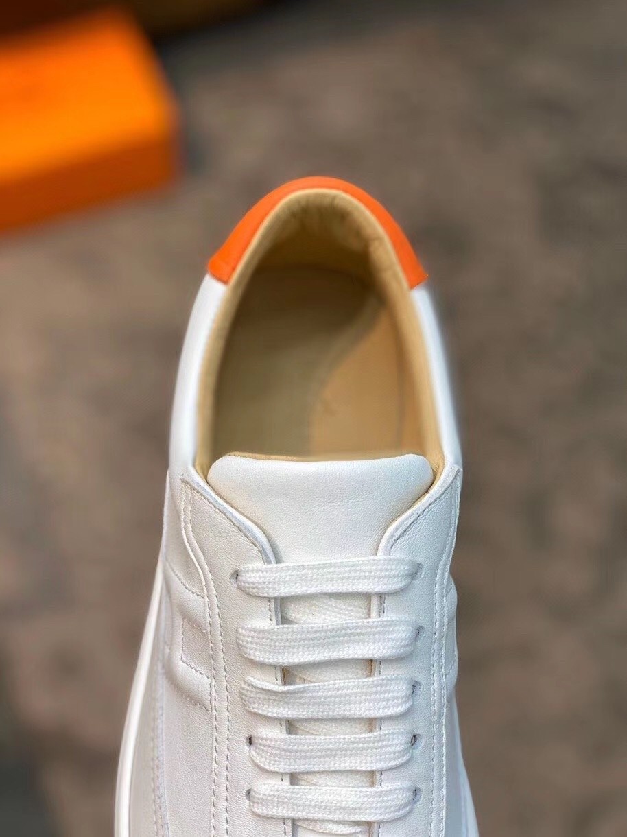 Hermes Quicker Sneakers In White/Orange Calfskin