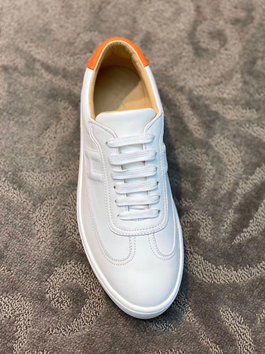 Hermes Quicker Sneakers In White/Orange Calfskin