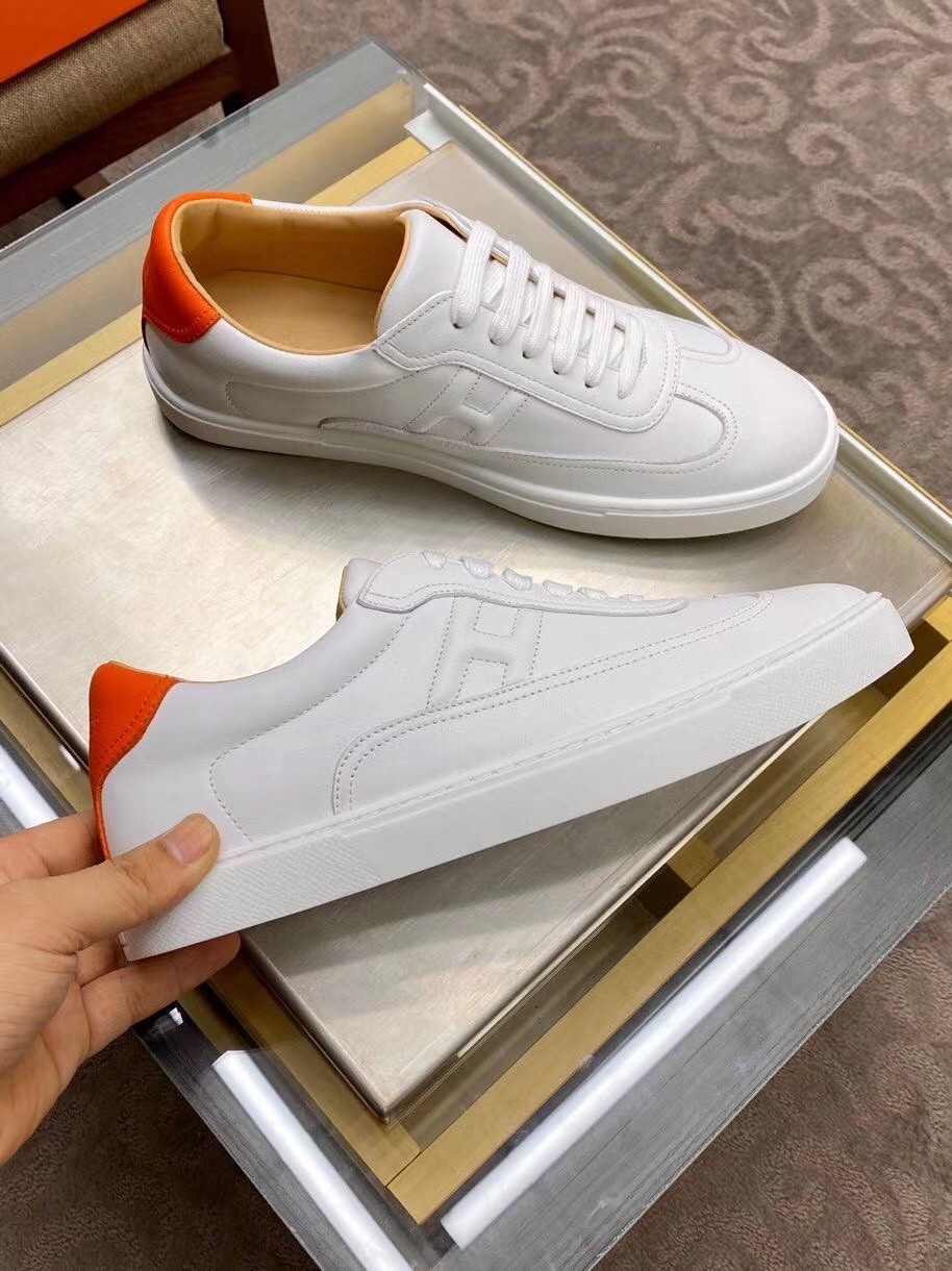 Hermes Quicker Sneakers In White/Orange Calfskin