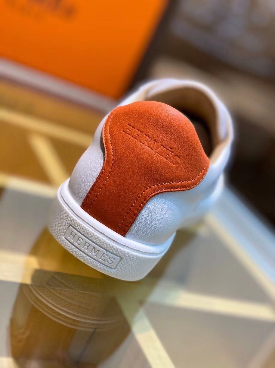 Hermes Quicker Sneakers In White/Orange Calfskin