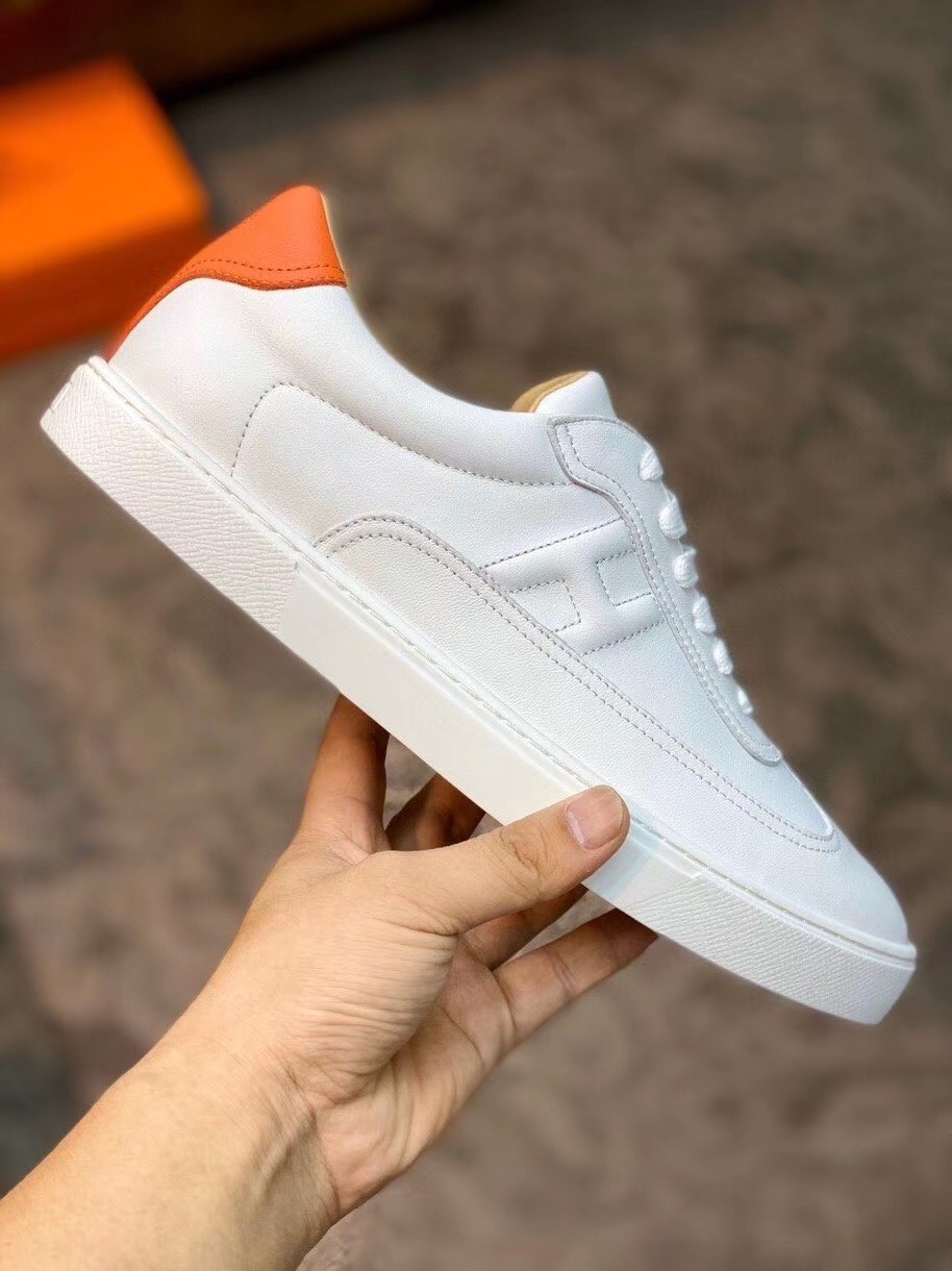 Hermes Quicker Sneakers In White/Orange Calfskin