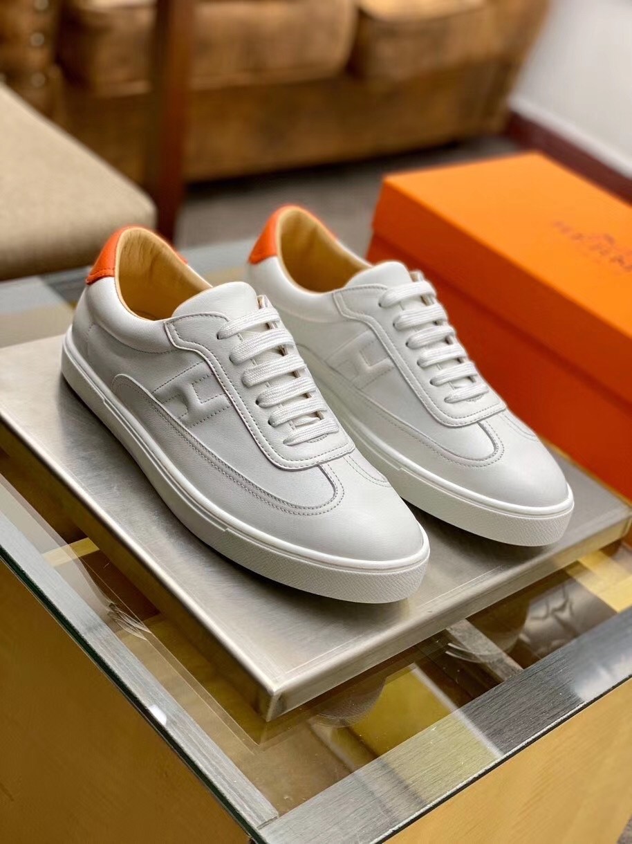 Hermes Quicker Sneakers In White/Orange Calfskin