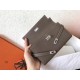 Hermes Kelly Classic Long Wallet In Etoupe Clemence Leather