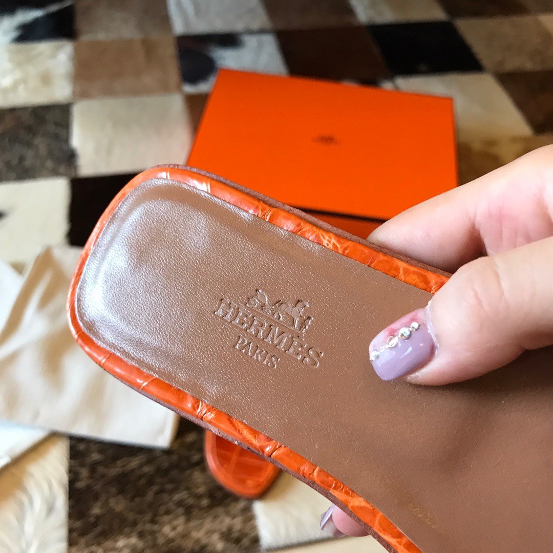 Hermes Oran Slide Sandals In Orange Shiny Niloticus Crocodile Skin