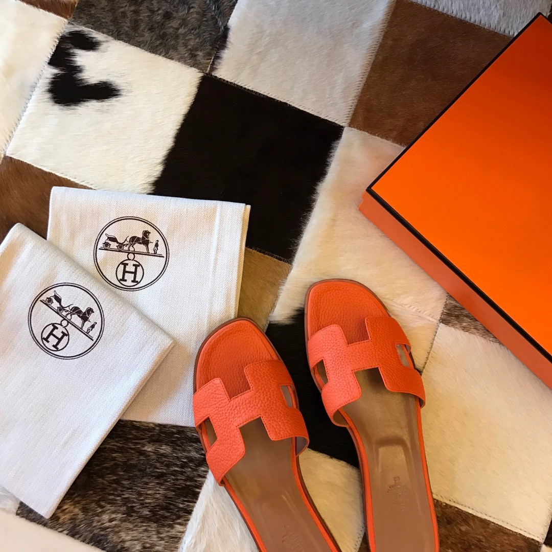 Hermes Oran Slide Sandals In Orange Clemence Leather