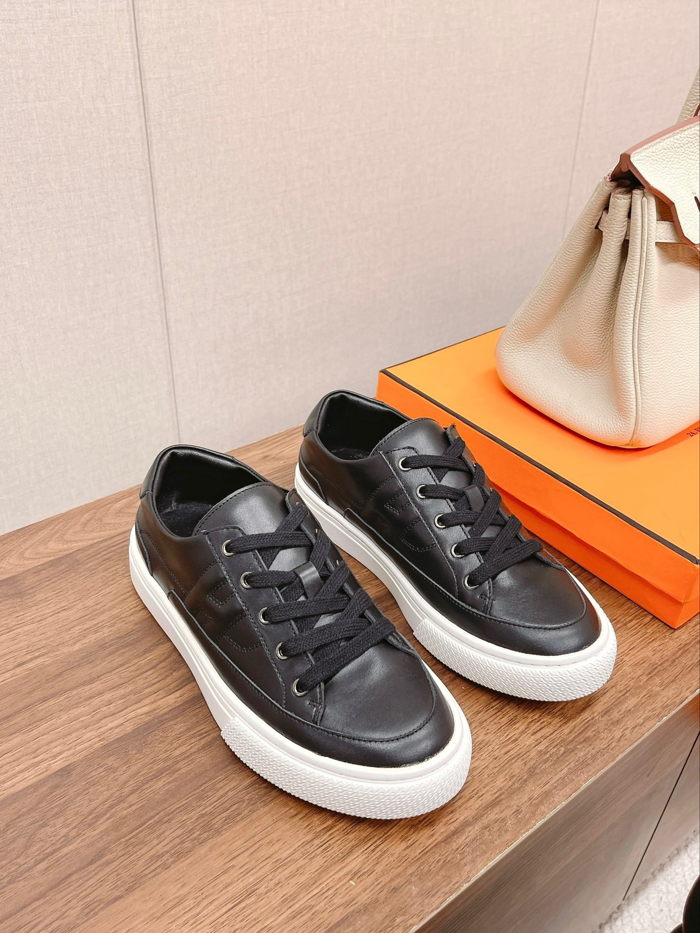 Hermes Women's Deep Sneakers in Black Leather